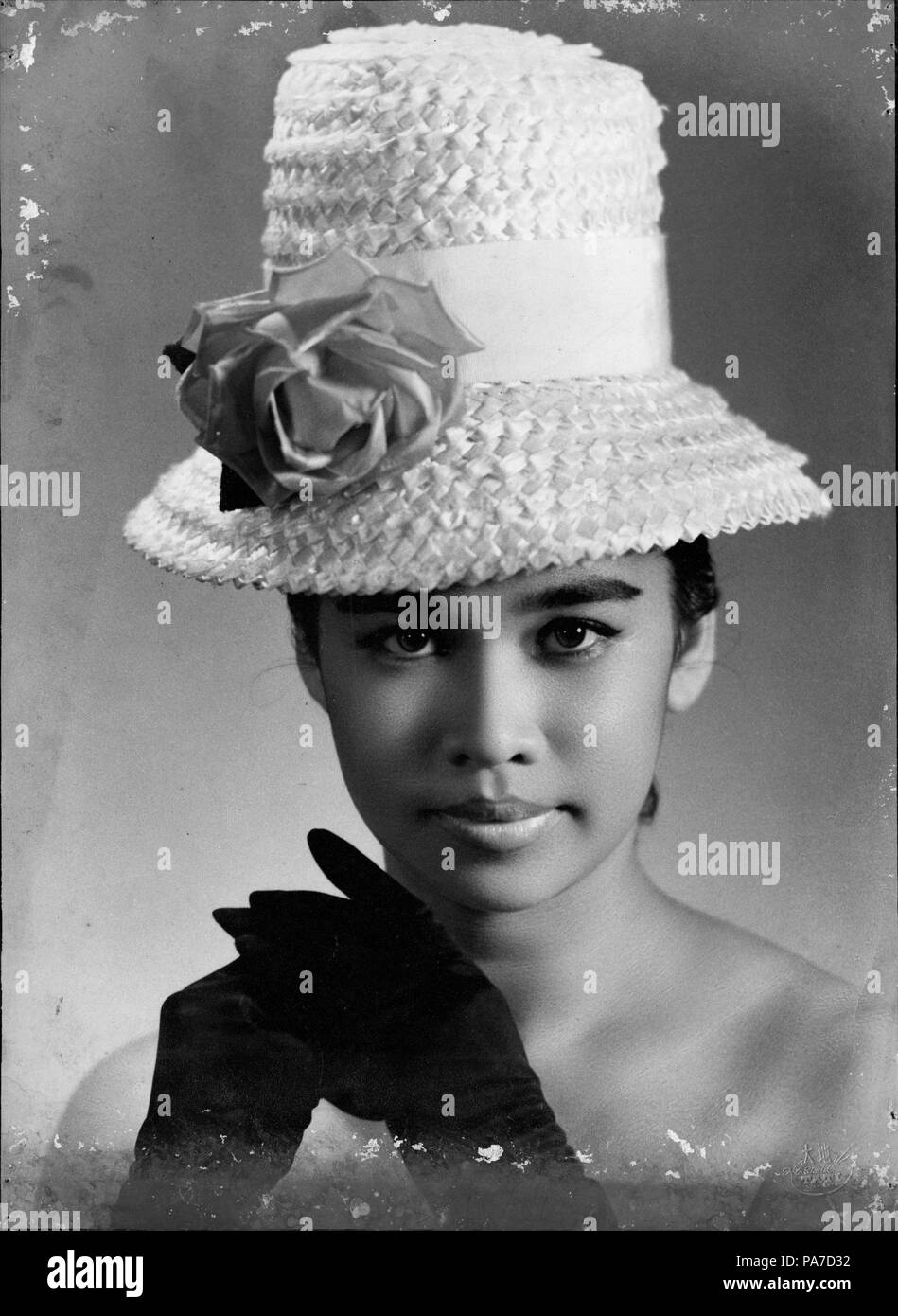 28 Baby Huwae, c 1963, Tati Photo Studio - Before restoration Stock Photo