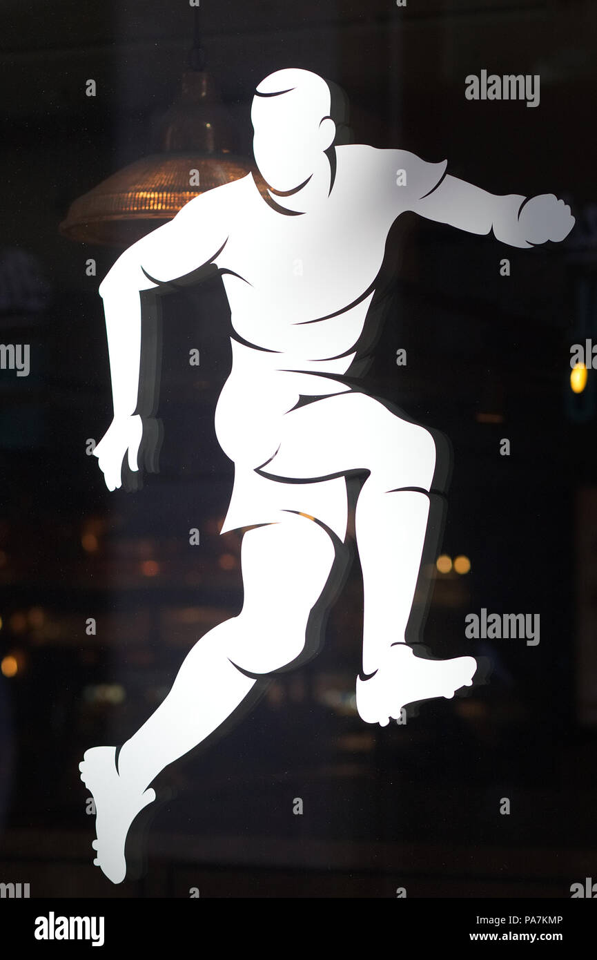 footballer in action window sticker Stock Photo Alamy