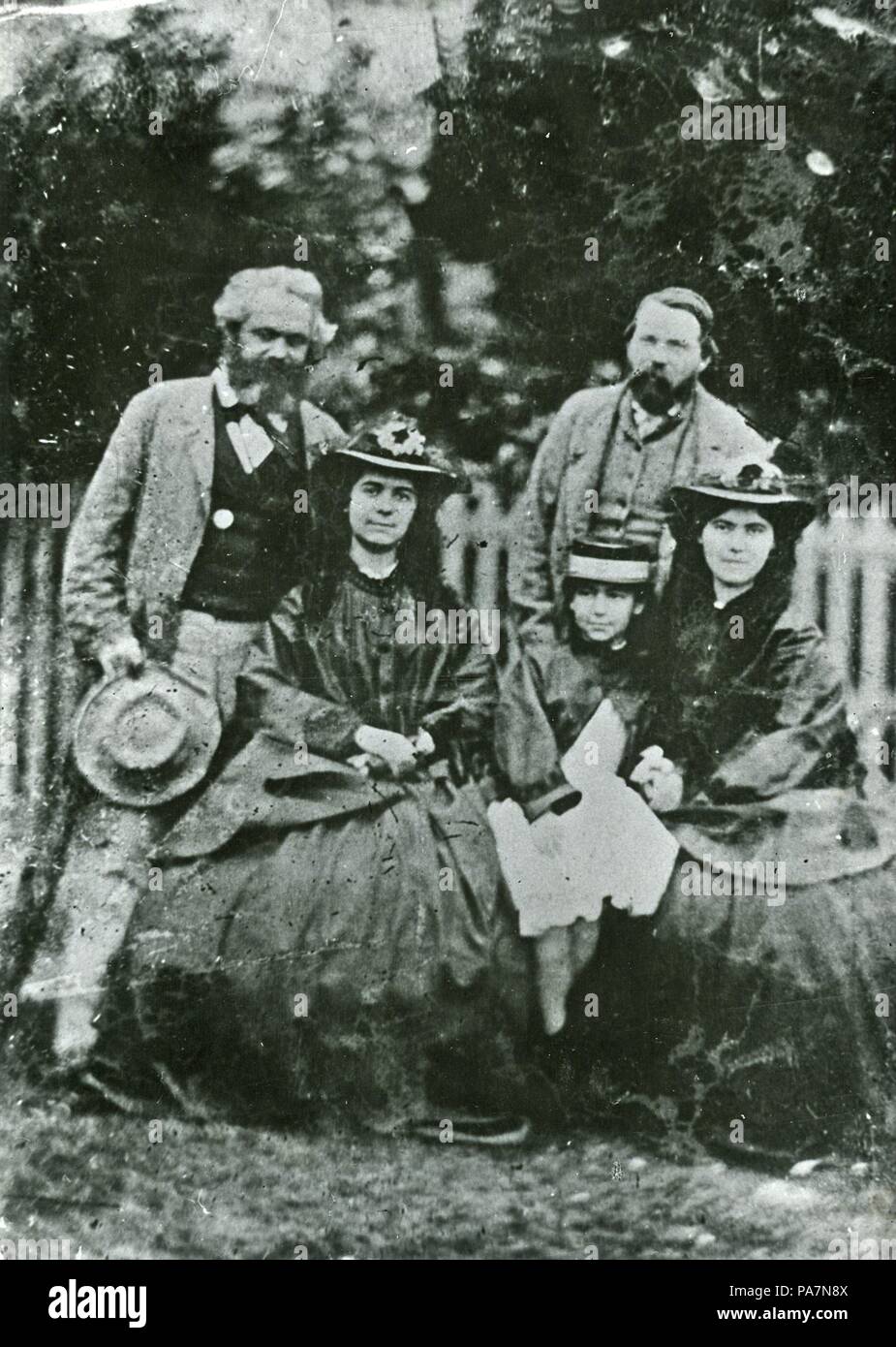 Karl Marx, Friedrich Engels and the daughters Jenny, Eleanor and Laura Marx. Museum: Stadtmuseum Simeonstift Trier. Stock Photo