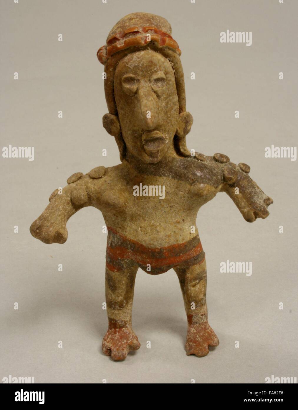 Standing Figure. Culture: Jalisco. Dimensions: H. 3 5/16 x D. 2 1/4 x  W. 1 in. (8.4 x 5.7 x 2.5 cm). Date: 2nd century. Museum: Metropolitan Museum of Art, New York, USA. Stock Photo