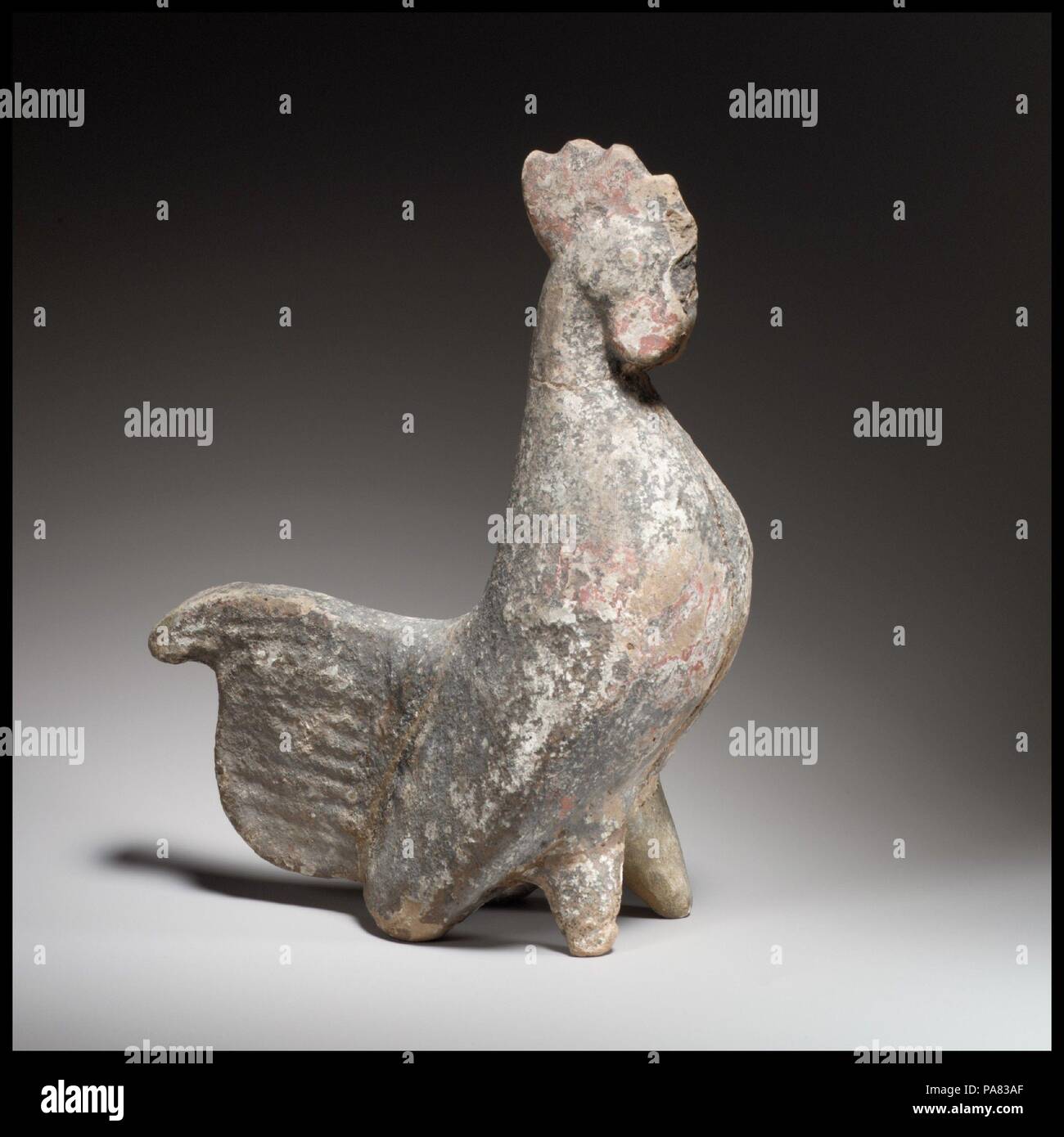 Rooster figurine. Culture: Cypriot. Dimensions: H. 8 9/16 in. (21.7 cm). Date: early 5th century B.C..  The figurine is mold-made in two molds and is hollow. The feet are handmade. Museum: Metropolitan Museum of Art, New York, USA. Stock Photo