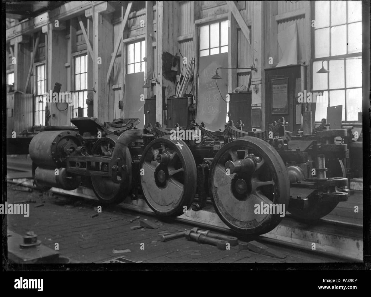 95 Frame and wheels for the front engine unit of 'Pearson's Dream', E class steam locomotive number 66, at the Petone Railway Workshops ATLIB 274447 Stock Photo