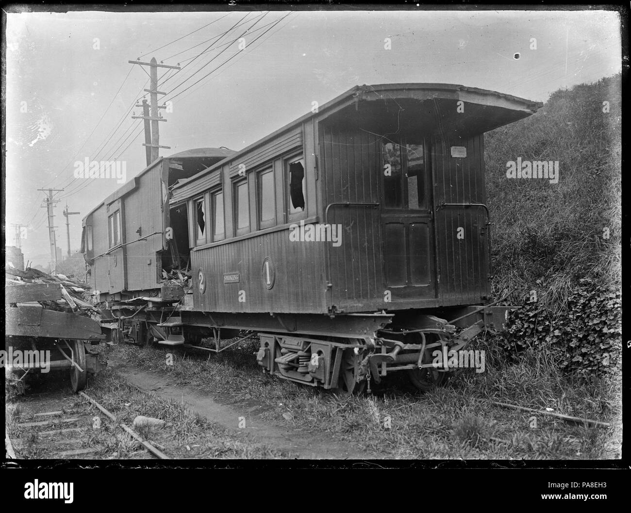 Exploding Carriage 78 Exterior view of a wrecked railway carriage and guard's van after an ...