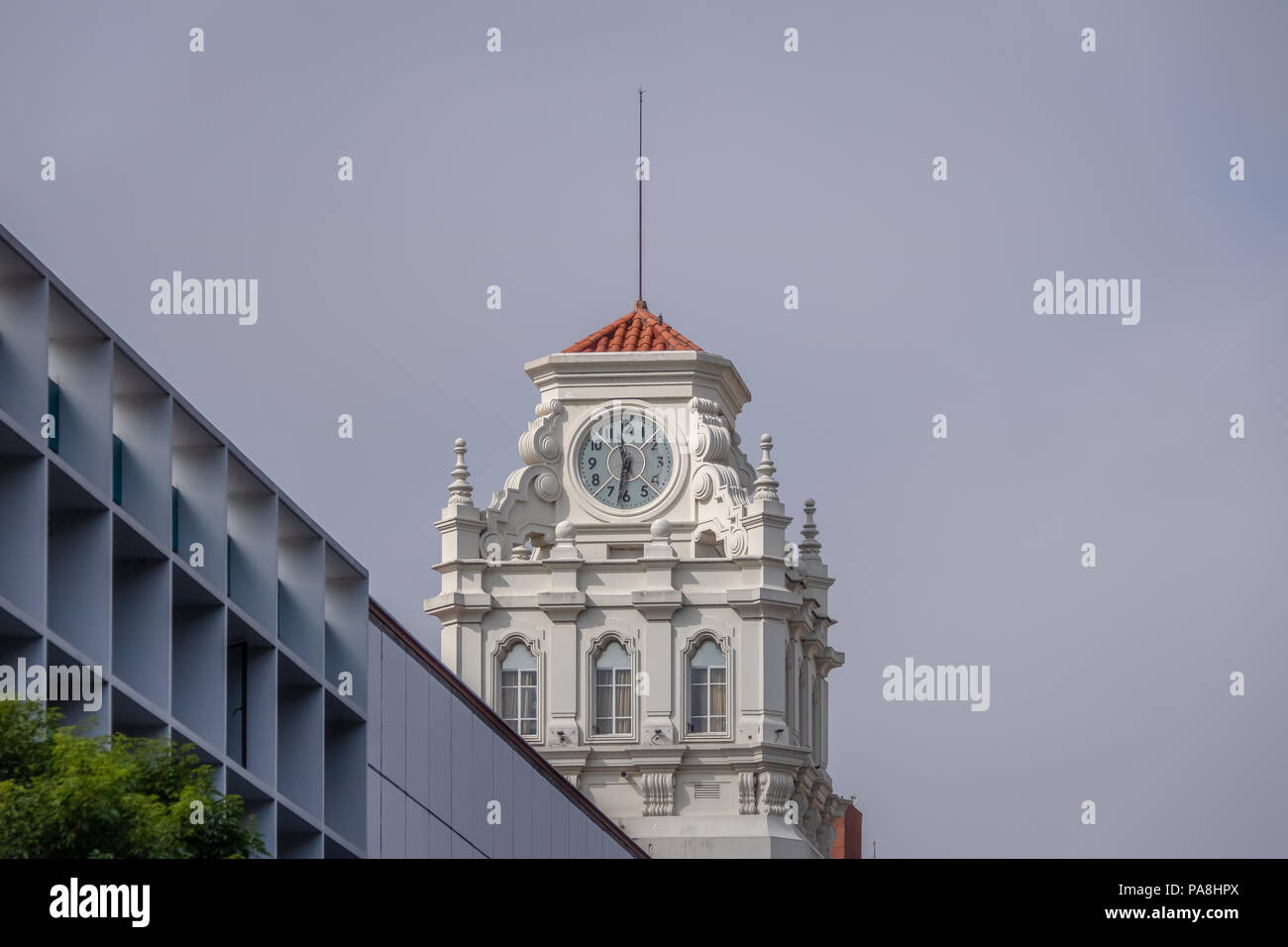 Clock tower of building near Plaza San Martin at Rivadavia and Rosario de Santa Fe street corner - Cordoba, Argentina Stock Photo