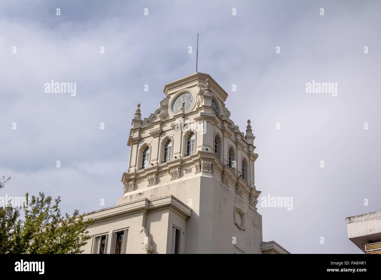 Clock tower of building near Plaza San Martin at Rivadavia and Rosario de Santa Fe street corner - Cordoba, Argentina Stock Photo