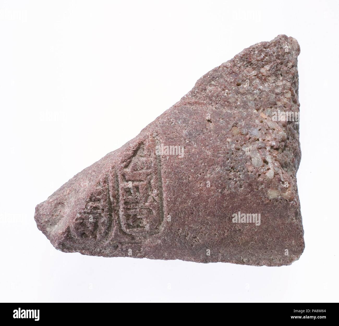 Upraised arm from offering scene with Aten cartouches. Dimensions: H. 8.5 × W. 9.7 × D. 3.2 cm (3 3/8 × 3 13/16 × 1 1/4 in.); arm between incise lines: W. 5.3 cm (2 1/16 in.); cartouche: W. 1.6 cm (5/8 in.). Dynasty: Dynasty 18. Reign: reign of Akhenaten. Date: ca. 1353-1336 B.C.. Museum: Metropolitan Museum of Art, New York, USA. Stock Photo