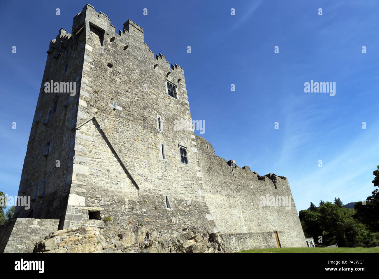 Ross Castle is a 15th-century tower house and keep on the edge of Lough Leane, in Killarney National Park, County Kerry, Ireland. Stock Photo