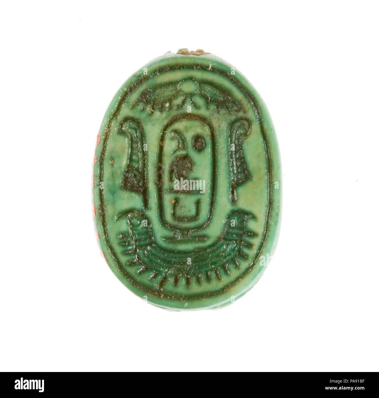 Scarab Inscribed for Maatkare (Hatshepsut). Dimensions: L. 1.8 cm (11/16 in.); w. 1.3 cm (1/2 in.). Dynasty: Dynasty 18, early. Reign: Joint reign of Hatshepsut and Thutmose III. Date: ca. 1479-1458 B.C..  During the 1926-1927 excavation season, the Museum's Egyptian Expedition uncovered three foundation deposits along the eastern enclosure wall of Hatshepsut's funerary temple at Deir el-Bahri in Western Thebes.  Among the contents were 299 scarabs and stamp-seals. Sixty-five of these are now in the Egyptian Museum, Cairo, and the rest were acquired by the Museum in the division of finds.  Amo Stock Photo