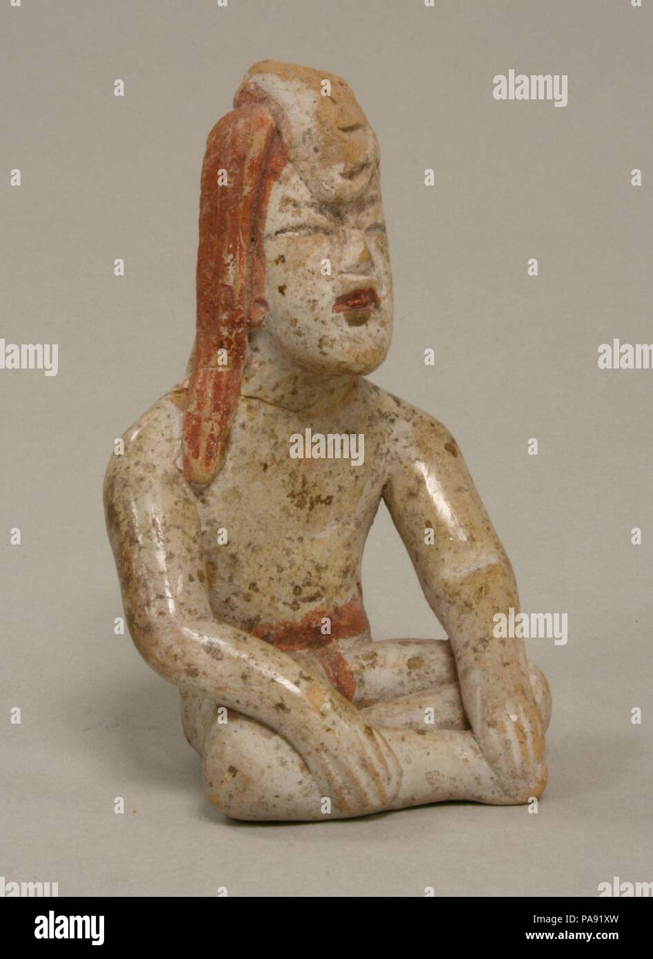Seated Figure. Culture: Olmec. Dimensions: Height 3-9/16 in. (9.2 cm). Date: 12th-9th century B.C.. Museum: Metropolitan Museum of Art, New York, USA. Stock Photo