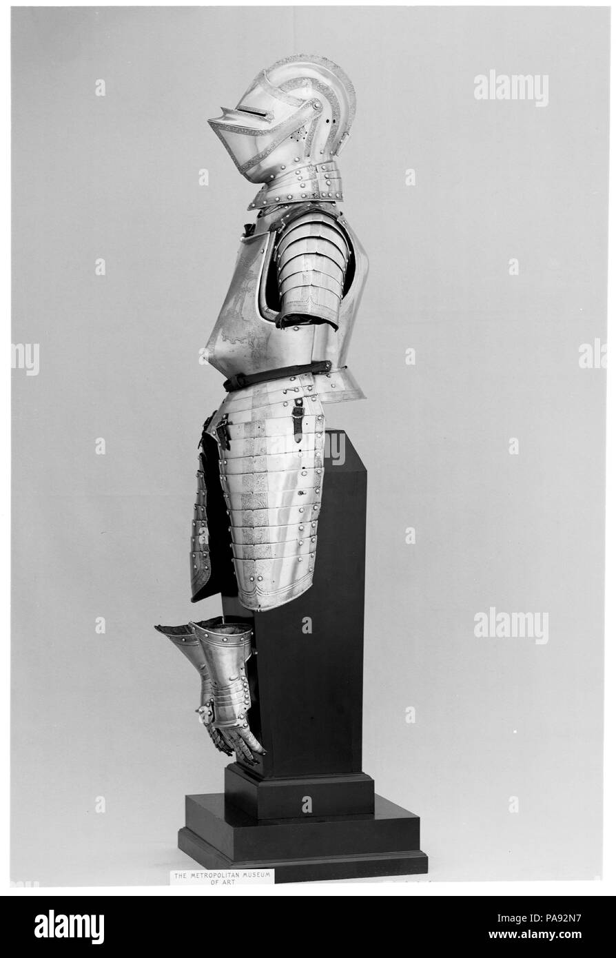 Close Helmet. Armorer: Attributed to Wolfgang Grosschedel (German, Landshut, active ca. 1517-62). Culture: German, Landshut. Dimensions: H. 14 3/4 in. (37.5 cm); W. 9 1/8 in. (23.2 cm); D. 13 1/4 in. (33.7 cm); Wt. 11 lb. 3.1 oz. (5077.4 g). Date: ca. 1560.  Grosschedel, Landshut's most renowned armorer of the mid-sixteenth century, fulfilled many commissions for both the German and the Spanish branches of the Hapsburg family. The decoration of this helmet is very similar to that of a large garniture made by Grosschedel for King Philip II of Spain (1513-1579) about 1560. It also resembles the  Stock Photo
