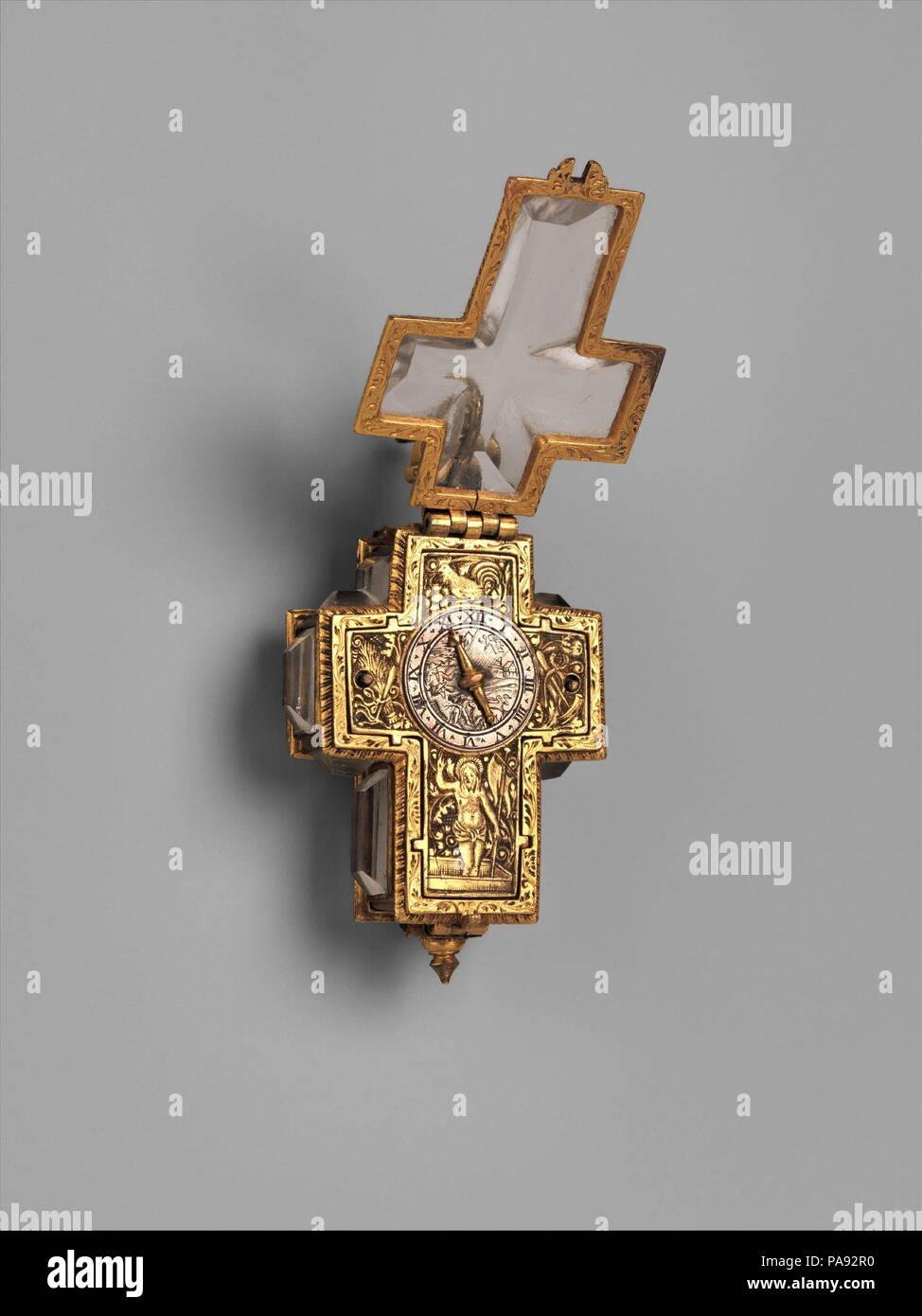 Watch. Culture: Swiss, Geneva. Dimensions: Overall: 1 7/8 × 1 1/4 in. (4.8 × 3.2 cm). Maker: Watchmaker: Anthoine Arlaud (born ca. 1590, after 1641). Date: ca. 1620-30.  Arlaud, a Huguenot refugee from the French Auvergne, was the first in a dynasty of Geneva watchmakers. He became a burgher in Geneva in 1617. The form of this watch and the scene of the Risen Christ, with the emblems of the Passion, are surely reminders of the brevity of life on earth and of the importance of the salvation of the soul. Museum: Metropolitan Museum of Art, New York, USA. Stock Photo