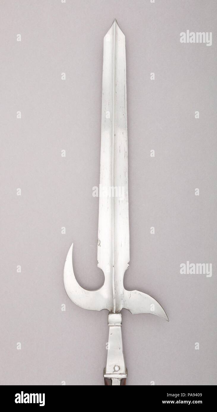 Halberd. Culture: Italian. Dimensions: L. 92 in. (233.8 cm); L. of head ...
