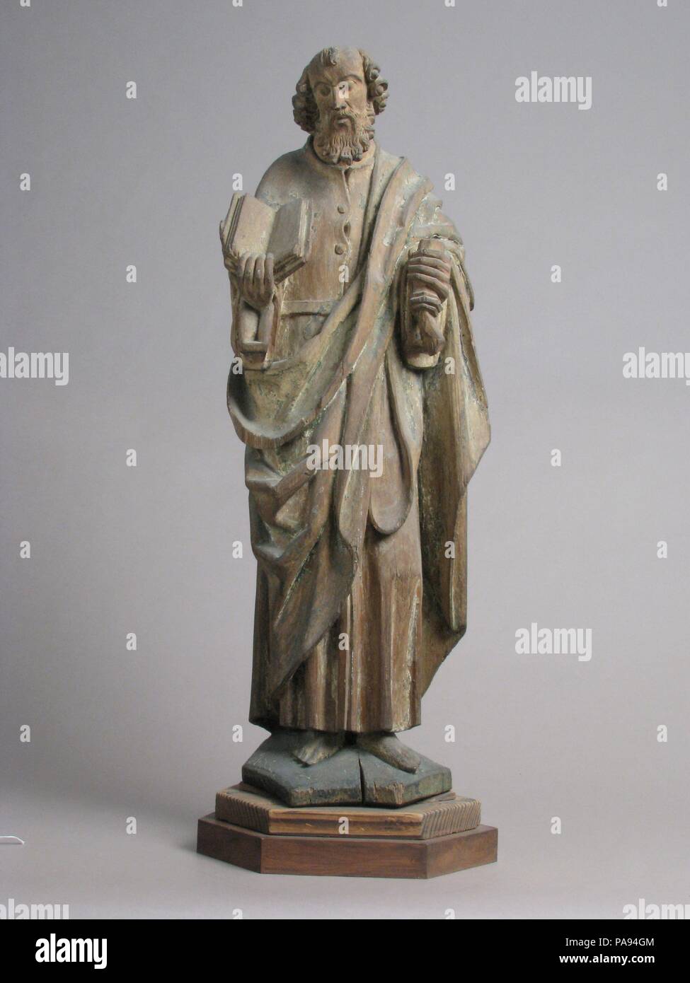 Saint Matthew (?). Culture: North Netherlandish. Dimensions: Overall: 24 5/8 x 8 3/4 x 5 1/2in. (62.5 x 22.2 x 14cm)  without base: 22 3/4 x 7 3/4 x 5in. (57.8 x 19.7 x 12.7cm). Date: ca. 1500. Museum: Metropolitan Museum of Art, New York, USA. Stock Photo