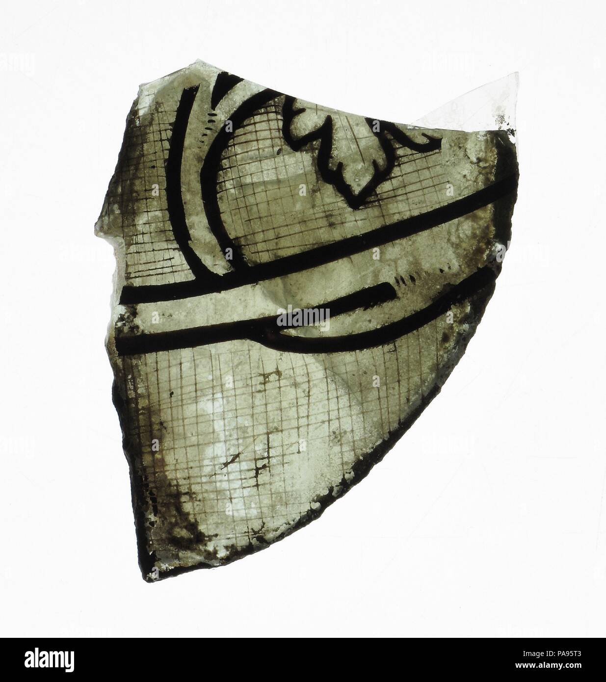 Glass Fragment. Culture: French. Dimensions: Overall: 2 15/16 x 2 9/16 in. (7.5 x 6.5 cm). Date: 14th century. Museum: Metropolitan Museum of Art, New York, USA. Stock Photo