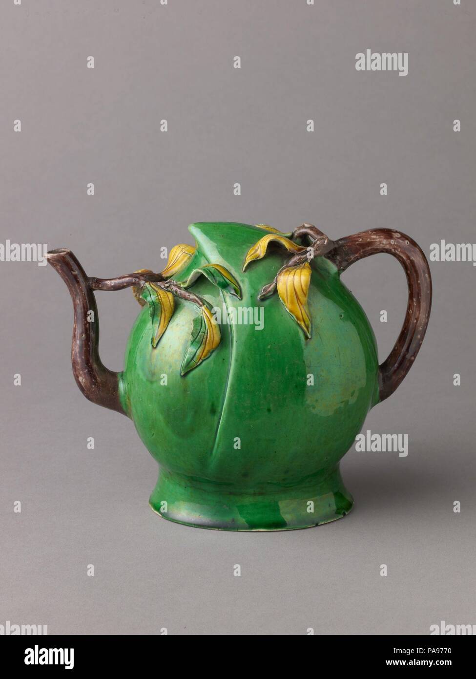 Peach-Shaped Wine Pot or Tea Pot. Artist: Chinese , Qing Dynasty, Later Transitional Period. Culture: Chinese. Dimensions: Height: 12.7 cm.. Date: ca. 1644-83. Museum: Metropolitan Museum of Art, New York, USA. Stock Photo