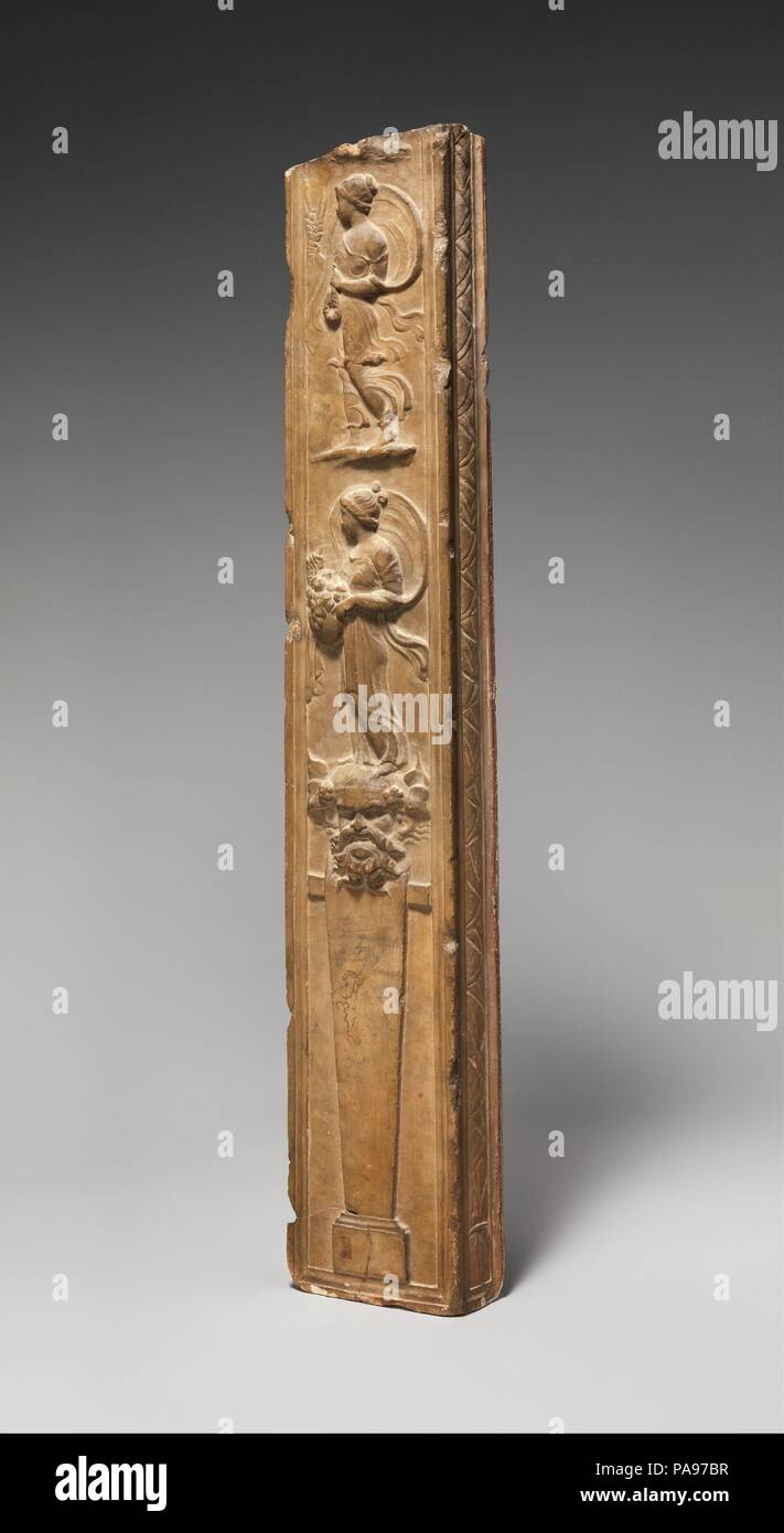 Marble pillar with Neo-Attic reliefs. Culture: Roman. Dimensions: H.: 39 5/8 in. (100.6 cm). Date: late 1st century B.C.-early 1st century A.D..  A fine example of classicizing art, this marble pillar bears on all four sides reliefs in the Neo-Attic style. The themes are drawn from the world of Dionysus. A flowering acanthus plant carved in low relief occupies one of the long sides, while on the other, in higher relief, two female figures with billowing garments surmount a Silenus herm. Their attributes identify them as Horae, the personifications of the Seasons. At the top is summer holding a Stock Photo