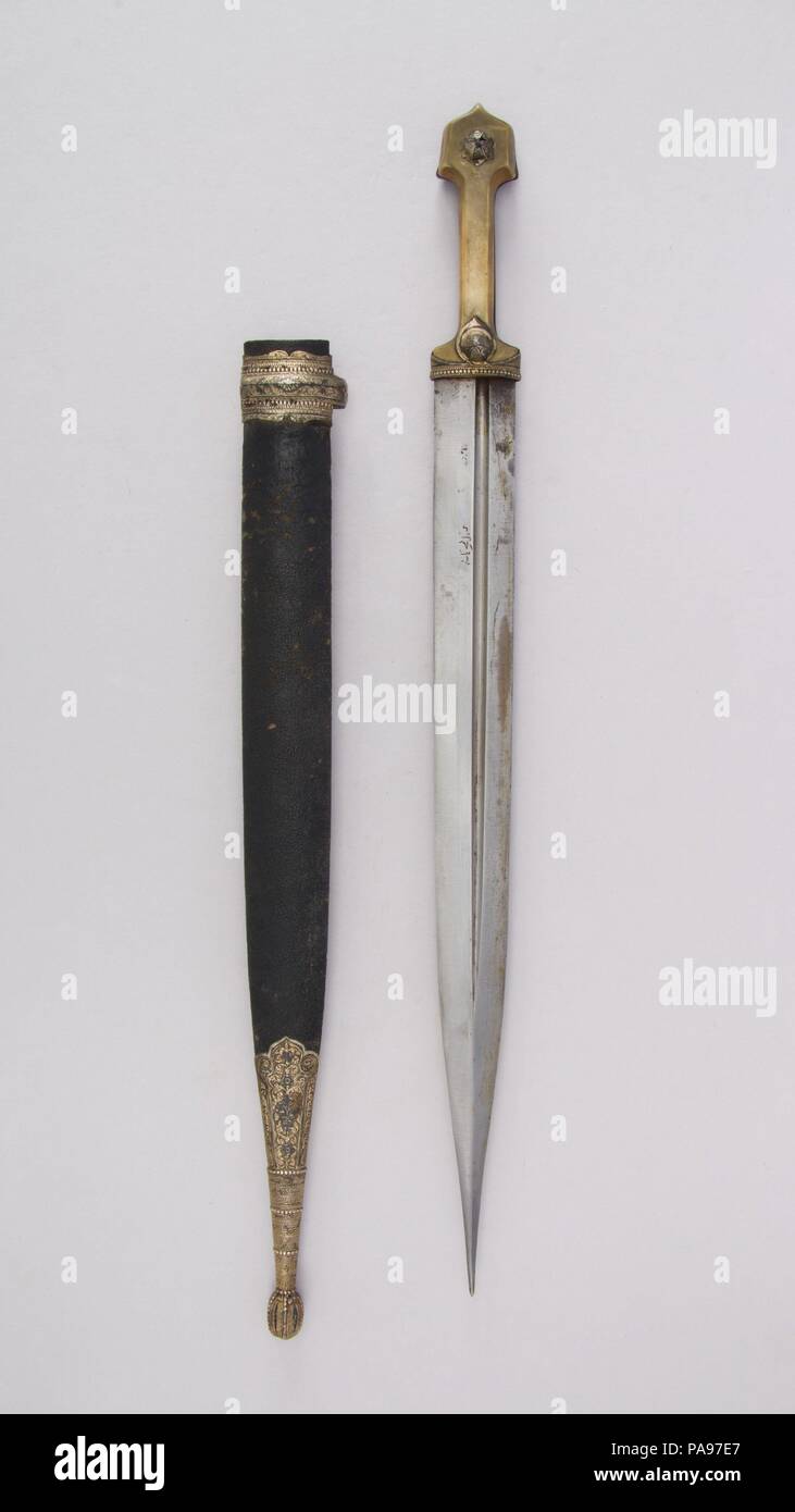 Dagger (Kindjal) with Sheath. Culture: Caucasian. Dimensions: L. with sheath 20 1/4 in. (51.4 cm); L. without sheath 19 in. (48.3 cm); W. 1 7/16 in. (3.7 cm); Wt. 9 oz. (255.1 g); Wt. of sheath 2.7 oz. (76.5 g). Date: 18th-19th century. Museum: Metropolitan Museum of Art, New York, USA. Stock Photo