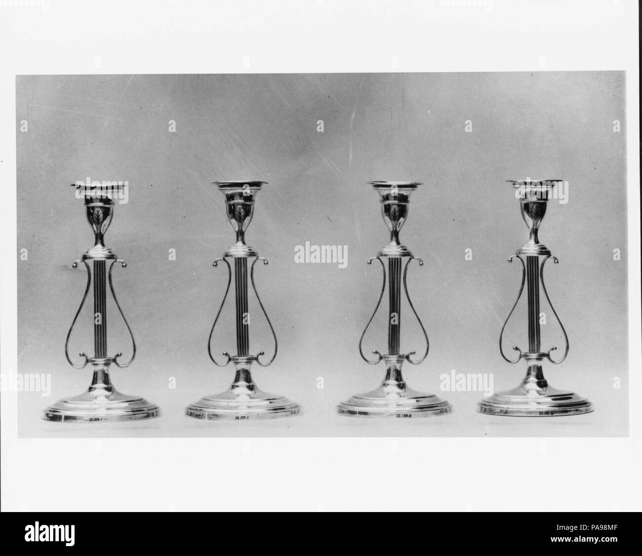 Candlestick. Dimensions: 11 9/16 x 6 3/16 in. (29.4 x 15.7 cm). Date: 1800-1830. Museum: Metropolitan Museum of Art, New York, USA. Stock Photo