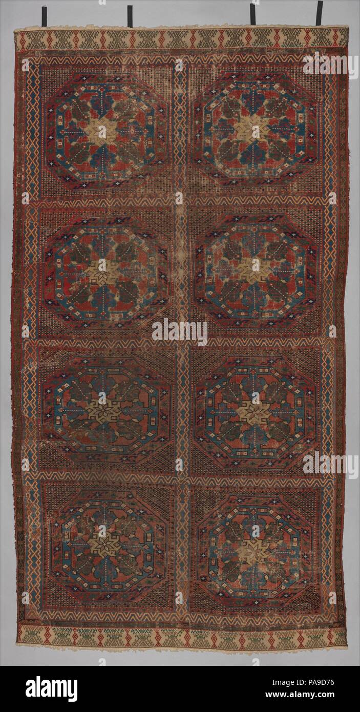 Carpet. Culture: Spanish. Dimensions: Overall: 122 x 66 1/2 in. (309.9 x 168.9 cm). Date: first half 15th century.  With its vividly colored pattern of stars and octagons, this rug exemplifies the distinctive 'Holbein' carpets that were produced in great numbers during the fifteenth century in the Spanish province of Murcia. Illustrated in paintings by Hans Holbein the Younger as well as other artists, these carpets--Spanish adaptations of Turkish designs--found a ready market among Christian patrons. Museum: Metropolitan Museum of Art, New York, USA. Stock Photo