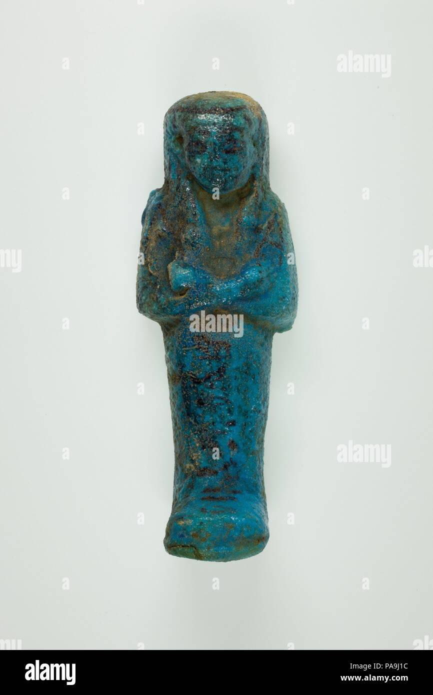 Worker Shabti of Henettawy (C), Daughter of Isetemkheb. Dimensions: h. 12.1 × w. 4.3 × d. 3.5 cm (4 3/4 × 1 11/16 × 1 3/8 in.). Dynasty: Dynasty 21. Date: ca. 990-970 B.C.. Museum: Metropolitan Museum of Art, New York, USA. Stock Photo