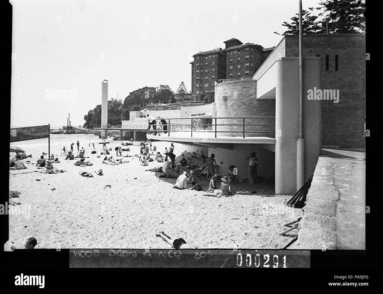 237 SLNSW 12001 Corner of Manly Beach looking toward Fairy Bower showing the shark tower for Building Publishing Co Stock Photo