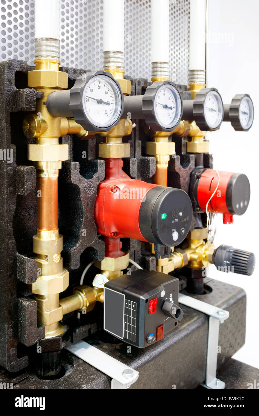 Close up of manometer, pipe, flow meter, water pumps and valves of