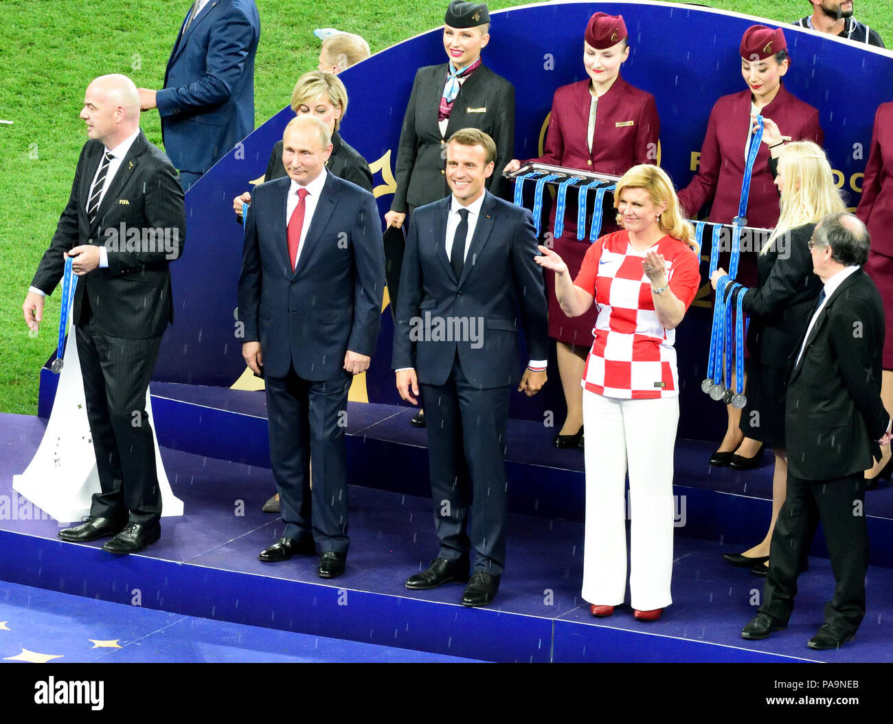 Moscow, Russia - July 15, 2018. Russian President Vladimir Putin, FIFA president Gianni Infantino, French president Emmanuel Macron and Croatia presid Stock Photo