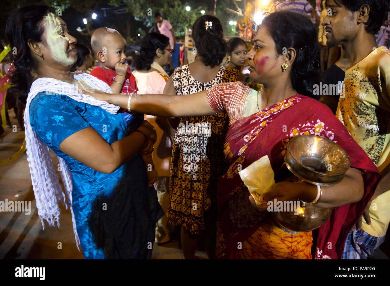 People and crowd during Durga puja celebration in Kolkata, India Stock Photo