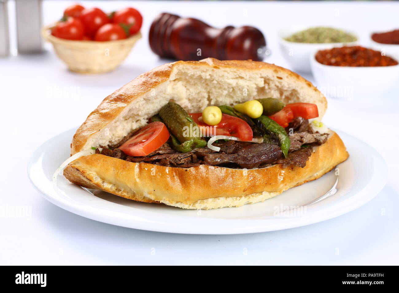 Traditional Turkish doner kebab shawarma in bread sandwich Stock Photo