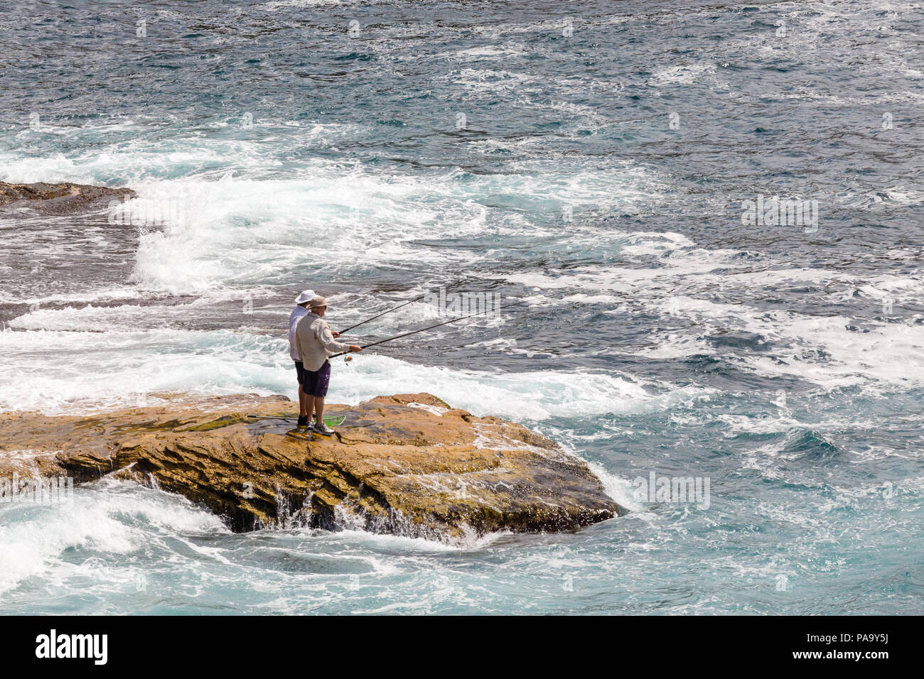 Two men fishing near Bondi Beach, Australia Stock Photo Alamy