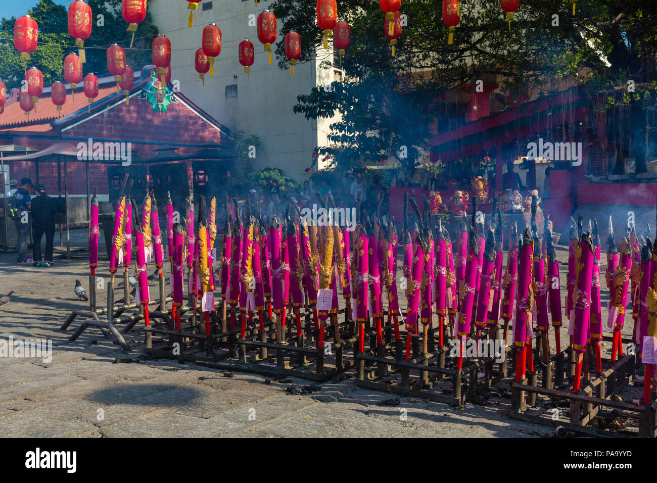 Incense sticks burining as offerings at the Goddess of Mercy Temple, Penang, Malaysia Stock Photo