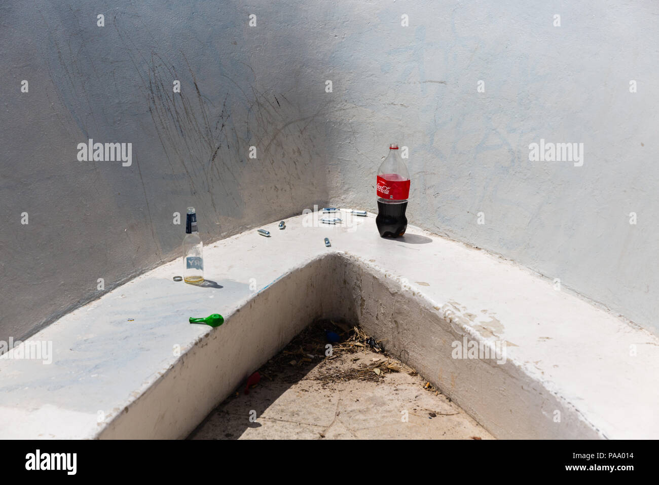 Drug use laughing gas canisters and balloon Stock Photo Alamy