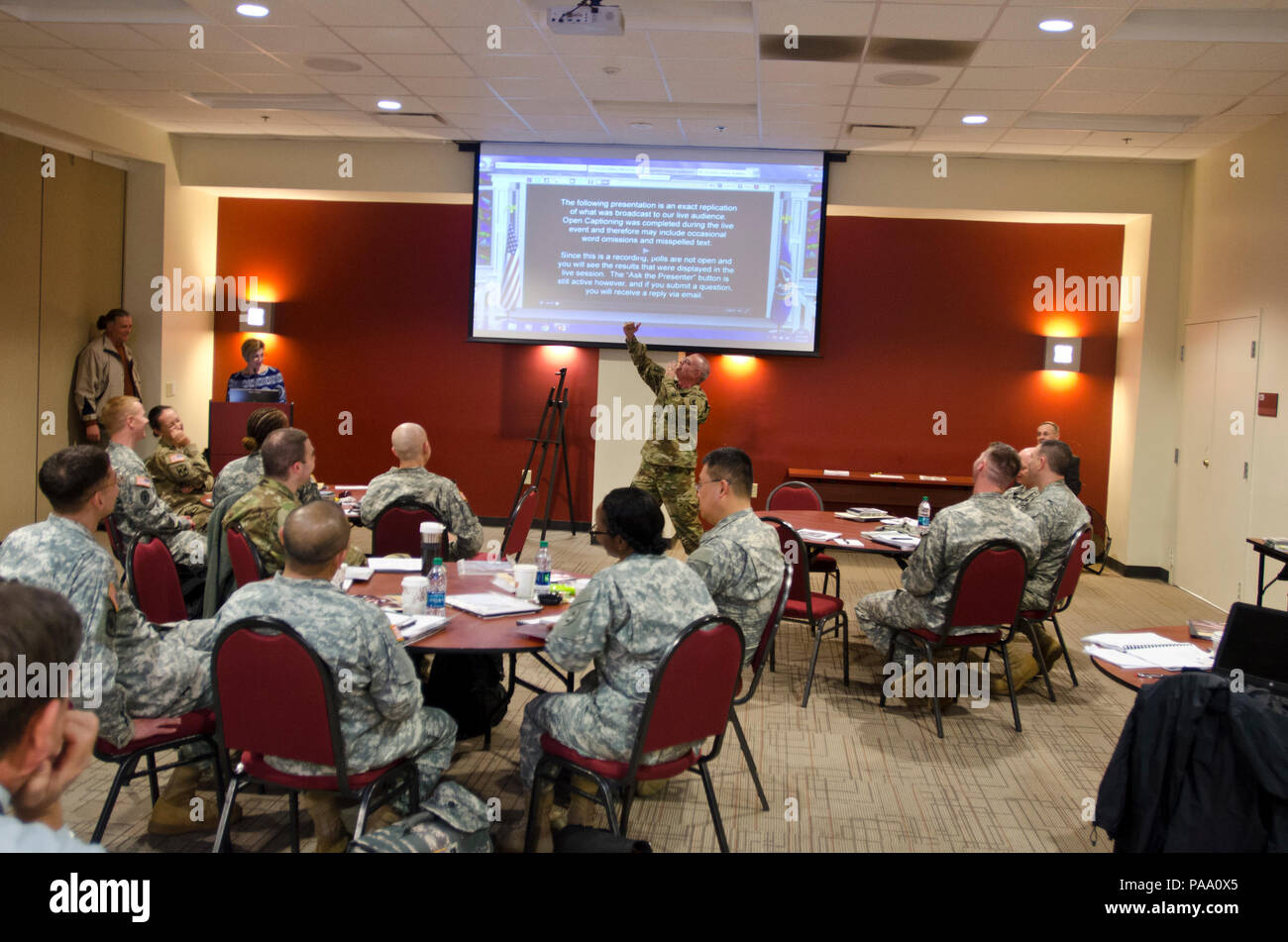 U.S. Army Reserve Command chaplain, Col. Randal Johnson, Soldier and Family Ministry chief, provides opening remarks at the Rural Clergy Training Program, a train-the-trainer seminar sponsored by The USARC chaplain office, in collaboration with the National Veteran Affairs Chaplain Center, at the Family Readiness Group Convention Center, Pope Army Airfield, N.C., March 2, 2016. The RCTP training seminar brought together representatives from all three military components from across the country into a learning environment designed to help facilitate the  education of  community clergy on how th Stock Photo