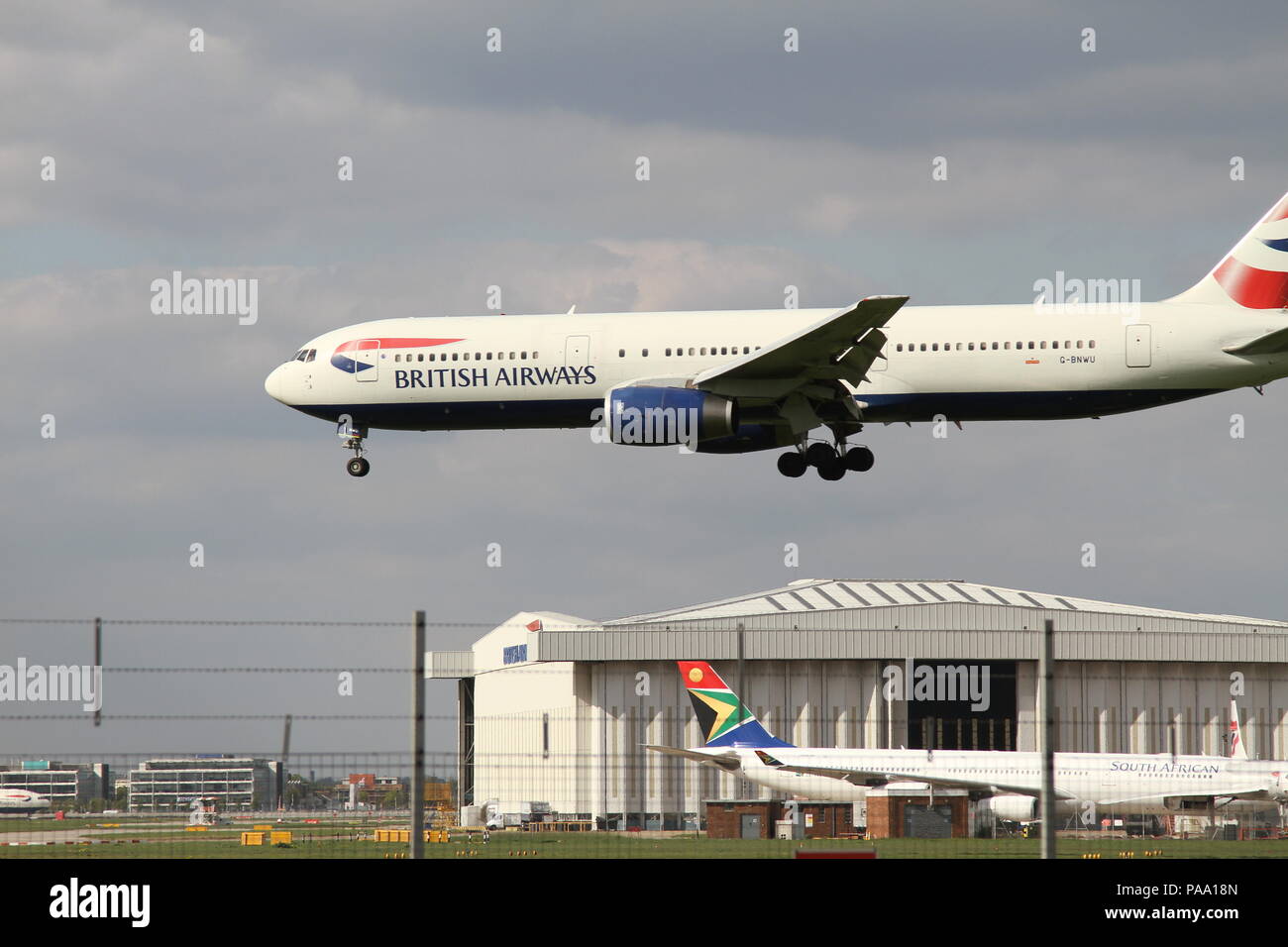 British Airways passenger jet landing at Heathrow airport, UK. Photo credit Russell Moore. Stock Photo