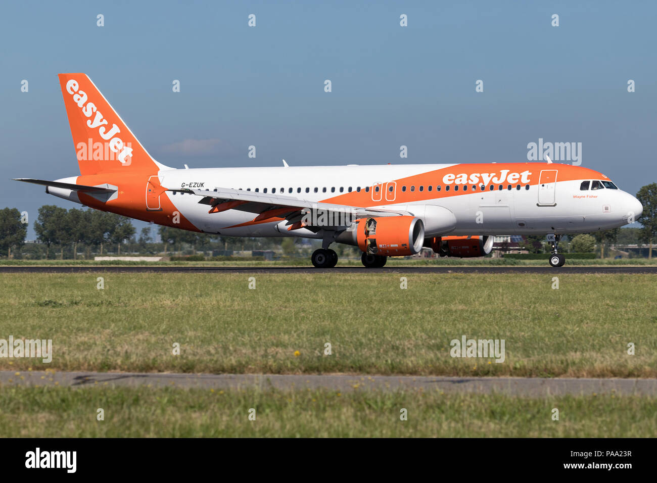 British easyJet Airbus A320-200 with registration G-EZUK just landed on runway 18R (Polderbaan) of Amsterdam Airport Schiphol. Stock Photo