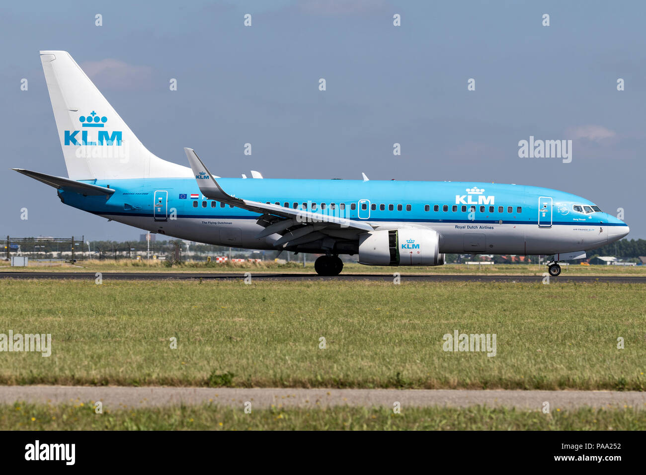 Dutch KLM Boeing 737-700 (old livery) with registration PH-BGW just landed on runway 18R (Polderbaan) of Amsterdam Airport Schiphol. Stock Photo