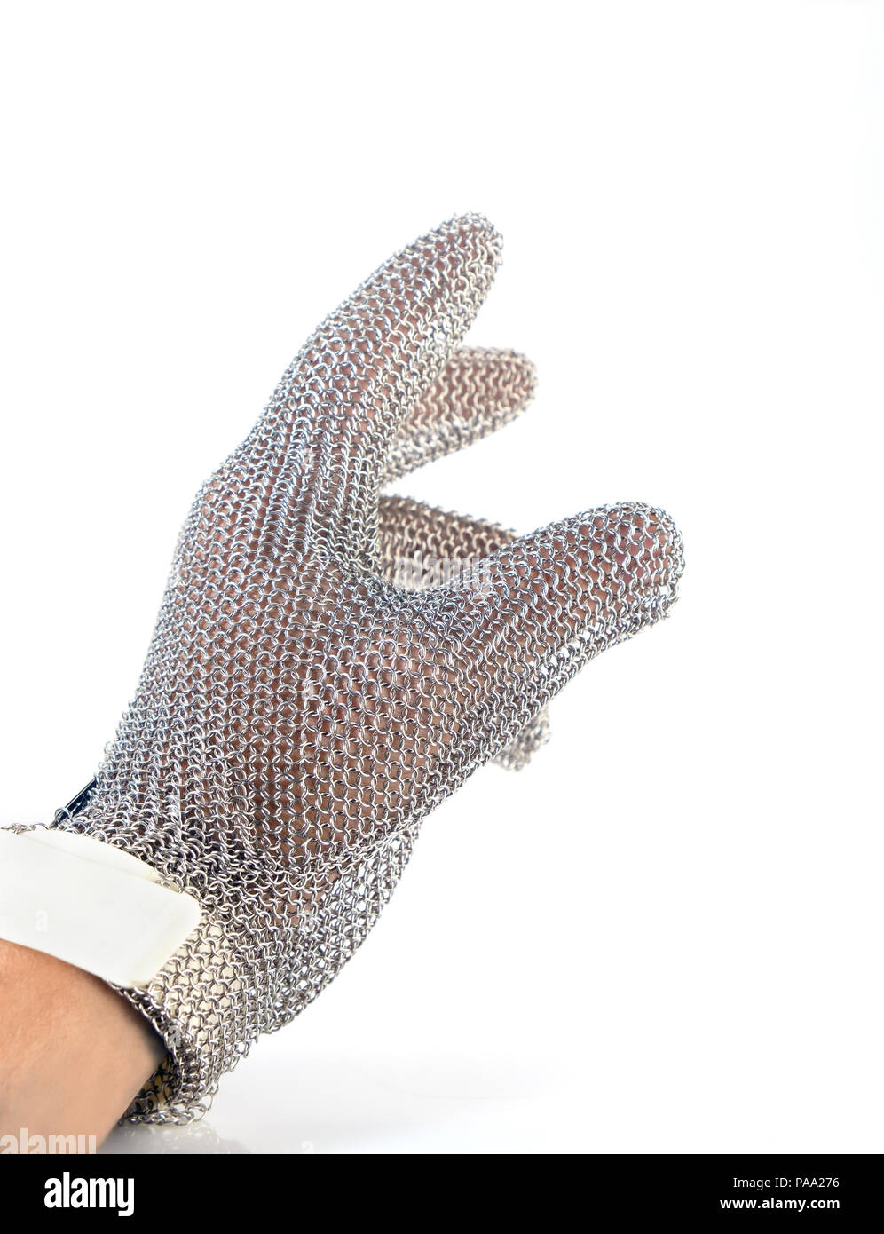 Hand with iron mesh glove on white background. Protection devices for industrial applications. Stock Photo