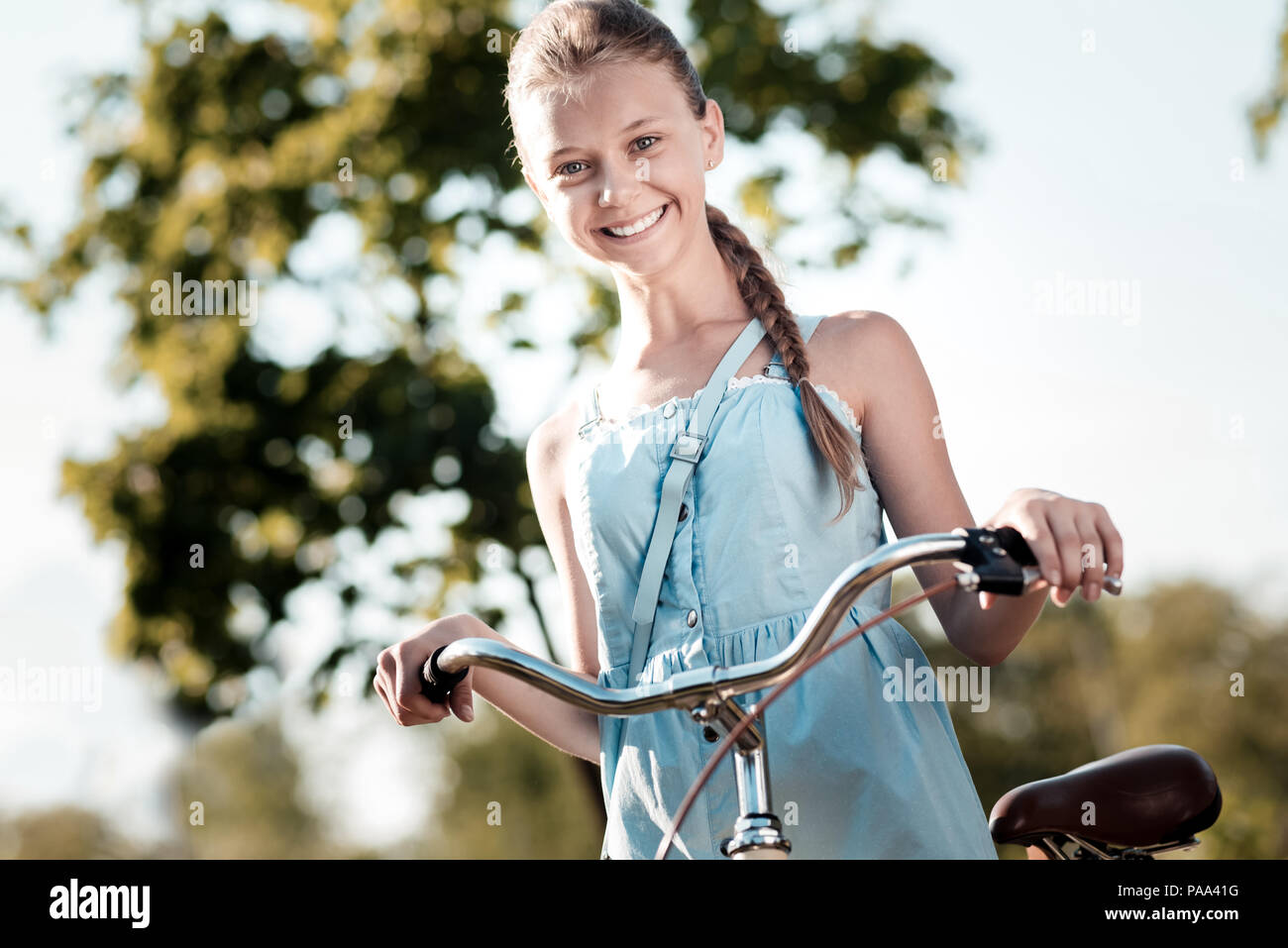Portrait of charming girl that looking at camera Stock Photo - Alamy
