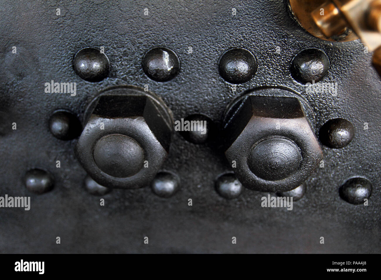 Screws as part of the steam engine, close-up Stock Photo - Alamy