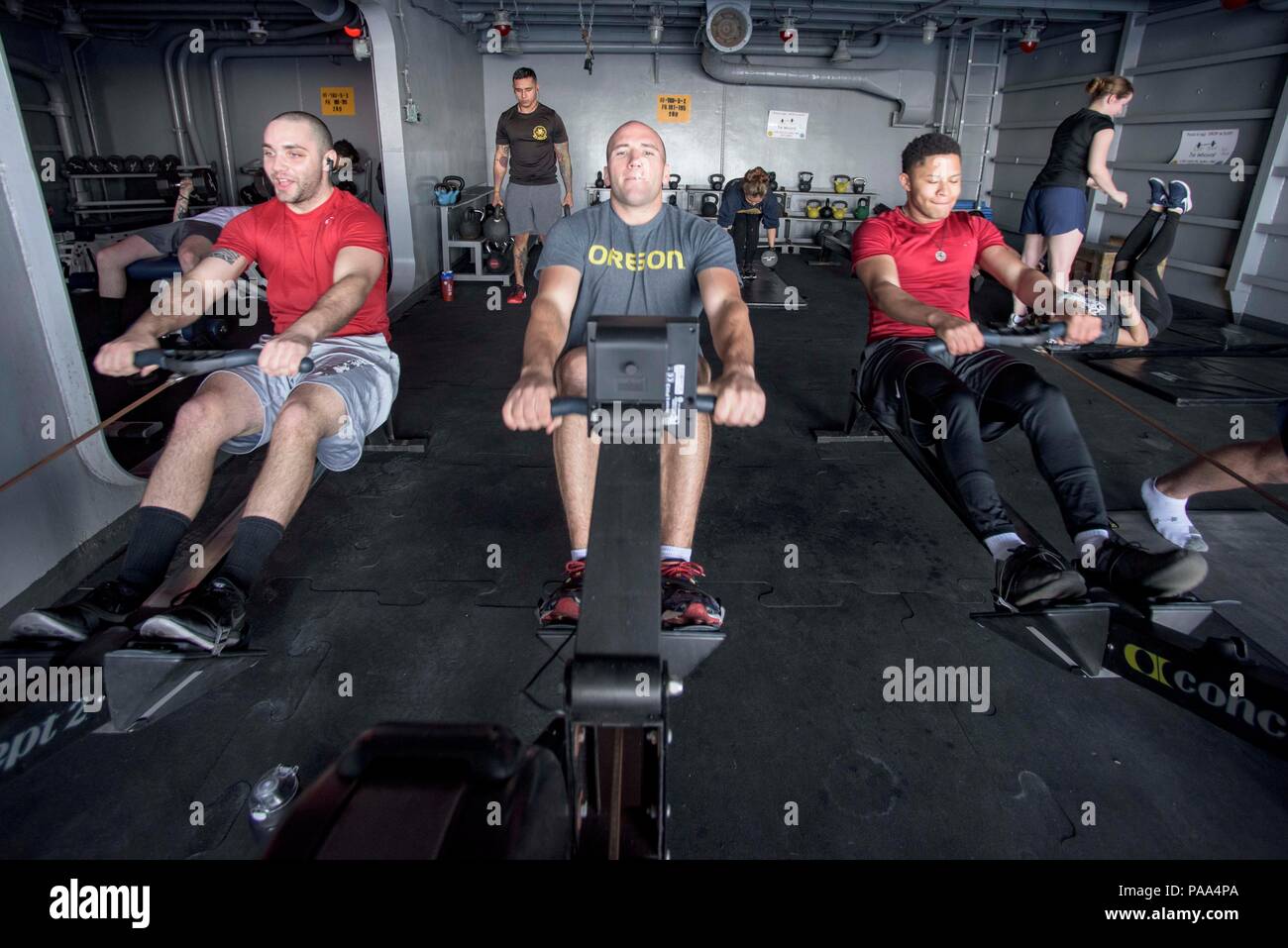 160322-N-KK394-030 ATLANTIC OCEAN (March 22, 2016) - Sailors use rowing  machines in the seaside gym of the aircraft carrier USS Dwight D.  Eisenhower (CVN 69), the flagship of the Eisenhower Carrier Strike