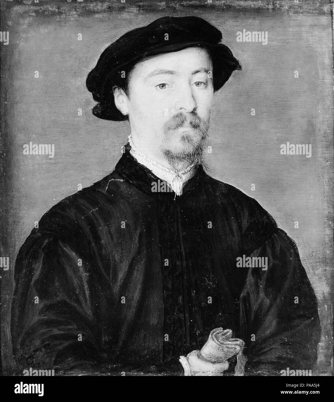 Portrait of a Man with Gloves. Artist: Attributed to Corneille de Lyon (Netherlandish, The Hague, active by 1533-died 1575 Lyons). Dimensions: 6 7/8 x 6 1/2 in. (17.5 x 16.5 cm). Date: 1540-45.  The striking formality of the pose of this sitter holding gloves, and his direct address of the viewer, may indicate his prominent position in society. Museum: Metropolitan Museum of Art, New York, USA. Stock Photo