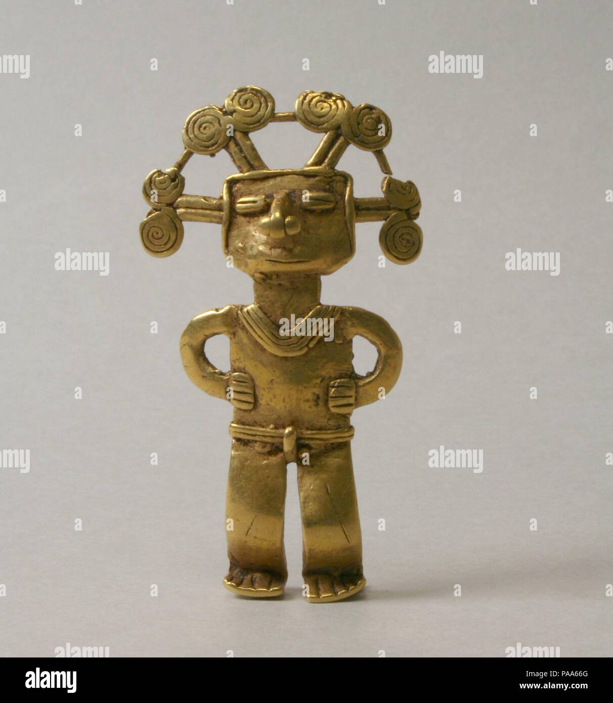 Figure Pendant. Culture: Colombia. Dimensions: Height 2-1/2 in. (6.4 cm). Date: 5th-10th century. Museum: Metropolitan Museum of Art, New York, USA. Stock Photo