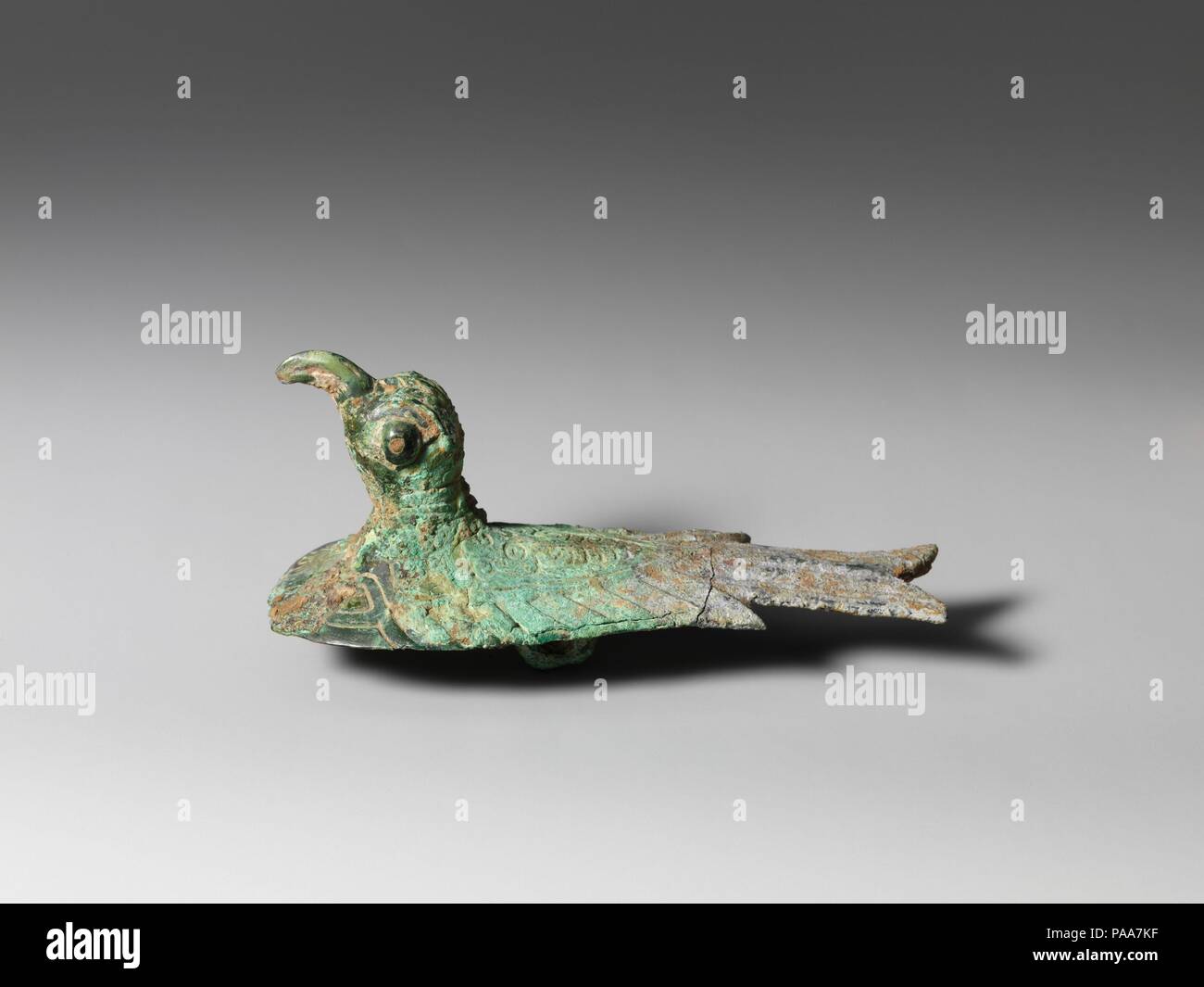 Fitting in the Shape of a Bird. Culture: China. Dimensions: H. 2 5/8 in. (6.7 cm); L. 5 1/8 in. (13 cm). Date: 11th-10th century B.C.. Museum: Metropolitan Museum of Art, New York, USA. Stock Photo