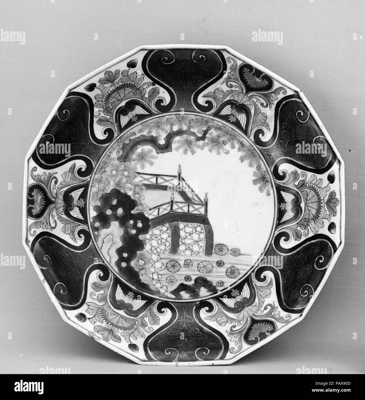 Dish with Stone Wall. Culture: Japan. Dimensions: H. 2 1/4 in. (5.7 cm); Diam. of rim 10 1/4 in. (26 cm); Diam. of foot 6 1/4 in. (15.9 cm). Date: first half of the 18th century. Museum: Metropolitan Museum of Art, New York, USA. Stock Photo