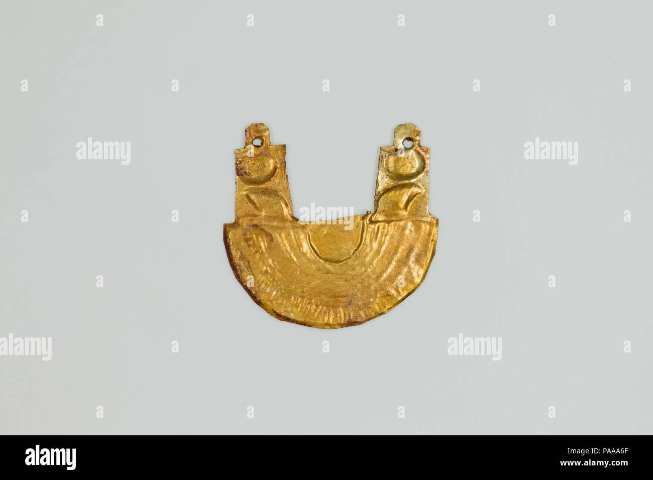Falcon-headed collar amulet. Dimensions: l. 2.3 cm (7/8 in.) × h. 2.2 cm (7/8 in.). Dynasty: Dynasty 26-29. Date: 664-380 B.C.. Museum: Metropolitan Museum of Art, New York, USA. Stock Photo