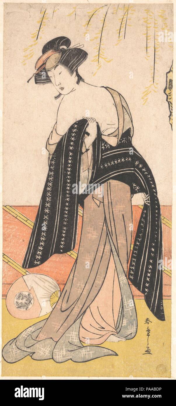 The Actor Nakamura Riko as an Oiran Tying Her Obi. Artist: Katsukawa Shunsho (Japanese, 1726-1792). Culture: Japan. Dimensions: 12 7/32 x 5 5/8 in. (31.1 x 14.3 cm). Date: ca. 1779. Museum: Metropolitan Museum of Art, New York, USA. Stock Photo