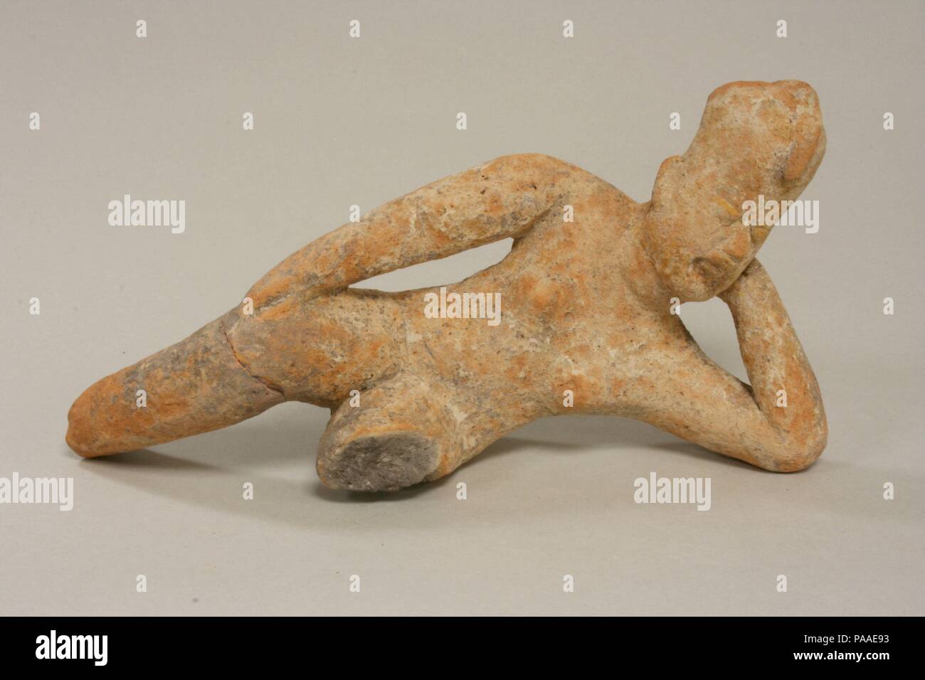 Reclining Ceramic Figure. Culture: Olmec. Dimensions: Length 9-1/8 in.. Date: 12th-9th century B.C.. Museum: Metropolitan Museum of Art, New York, USA. Stock Photo