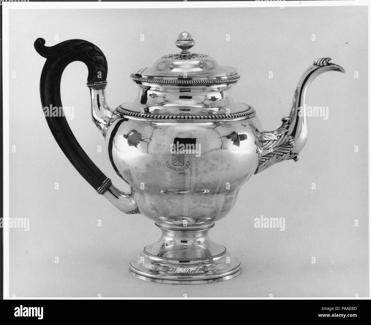 Coffeepot. Culture: American. Dimensions: Overall: 9 7/8 x 13 5/16 x 6 5/8 in. (25.1 x 33.8 x 16.8 cm); 44 oz. 12 dwt. (1387 g)  Foot: Diam. 4 13/16 in. (12.2 cm). Maker: Harvey Lewis (ca. 1783-1835). Date: 1827. Museum: Metropolitan Museum of Art, New York, USA. Stock Photo