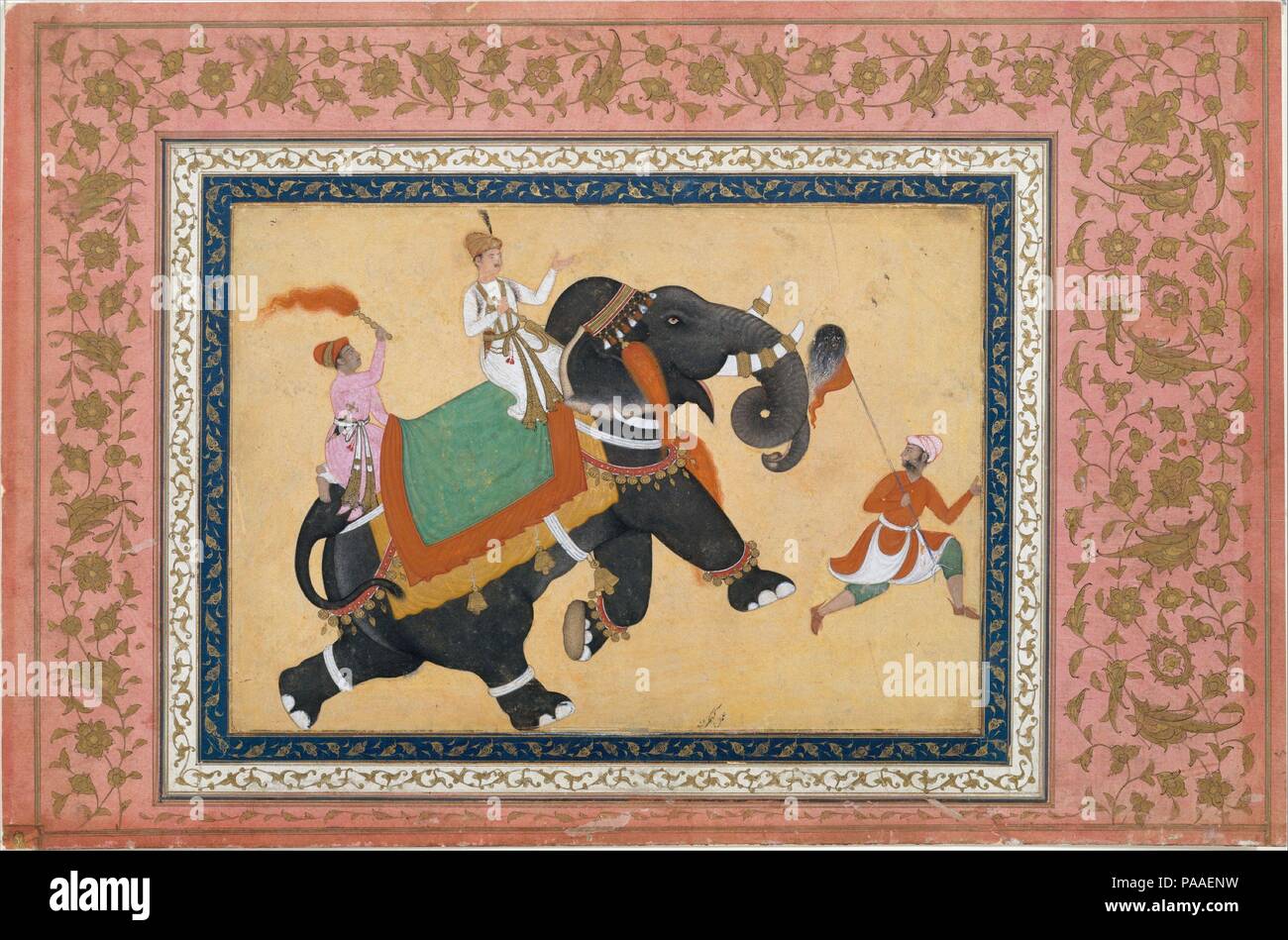 Prince Riding an Elephant. Artist: Painting by Khem Karan. Dimensions: Page: H. 12 1/4 in. (31.1 cm)  W. 18 1/2 in. (47 cm)  Painting: H. 7 3/4 in. (19.7 cm)  W. 10 3/4 in. (27.3 cm)  Mat: H. 19 1/4 in. (48.9 cm)   W. 14 1/4 in. (36.2 cm). Date: 16th-17th century.  Elephants were highly prized at Indian courts, greatly appreciated as gifts, and eagerly sought as booty in military campaigns. Paintings of several admired elephants were made at the Mughal court, much as portraits were made of courtiers and nobles. Khem Karan, whose signature appears at the bottom of the picture, was a well-known  Stock Photo