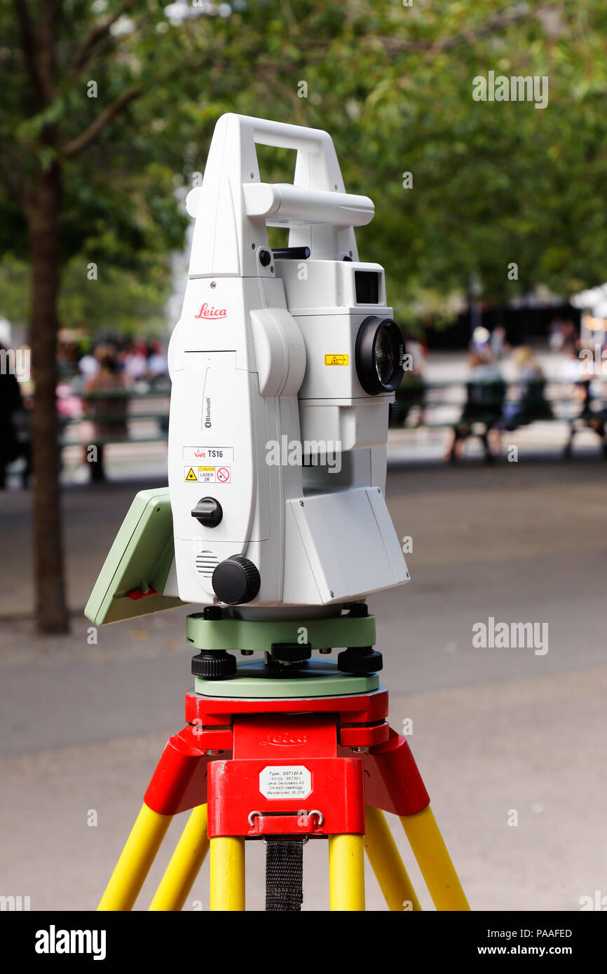 Stockhoilm, Sweden - July 12, 2018: One Leica Viva TS16 total station physical geography measure instrument located in the Kungstradgarden park. Stock Photo